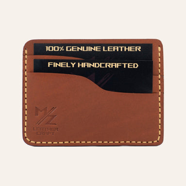 MZ Leather Craft yatay minimalist kiremit Buttero deri kartlık, kartlarla dolu önden görünüm, sarı el dikişleri ve sol alt köşede kabartmalı MZ logosu