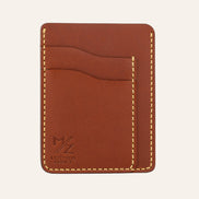 MZ Leather Craft dikey minimalist kiremit Buttero deri kartlık, boş kart yuvalarını ve pürüzsüz deri dokusunu gösteren düz ön görünüm, sarı el dikişleri ve kabartmalı MZ logosu