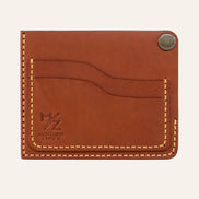 MZ Leather Craft köşe çıtçıtlı ters cüzdan kiremit Buttero deri, boş kart yuvalarını, kıvrımlı kesim hatlarını ve kapalı köşe çıtçıtını gösteren ön görünüm