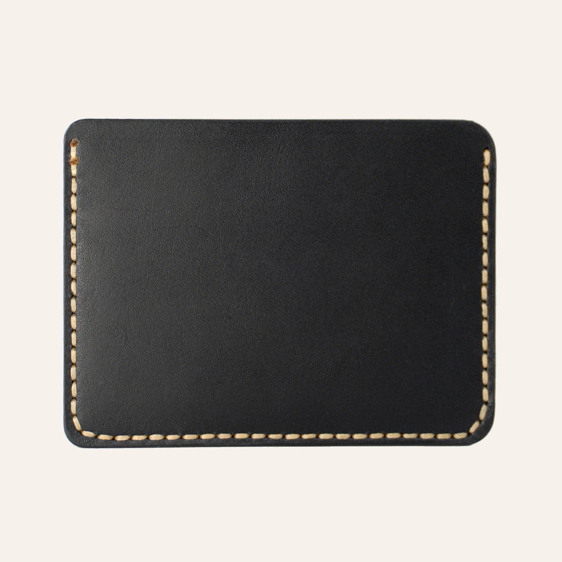 MZ Leather Craft yatay minimalist siyah Buttero deri kartlık, temiz arka paneli ve çevreleyen sarı el dikişlerini gösteren arka görünüm