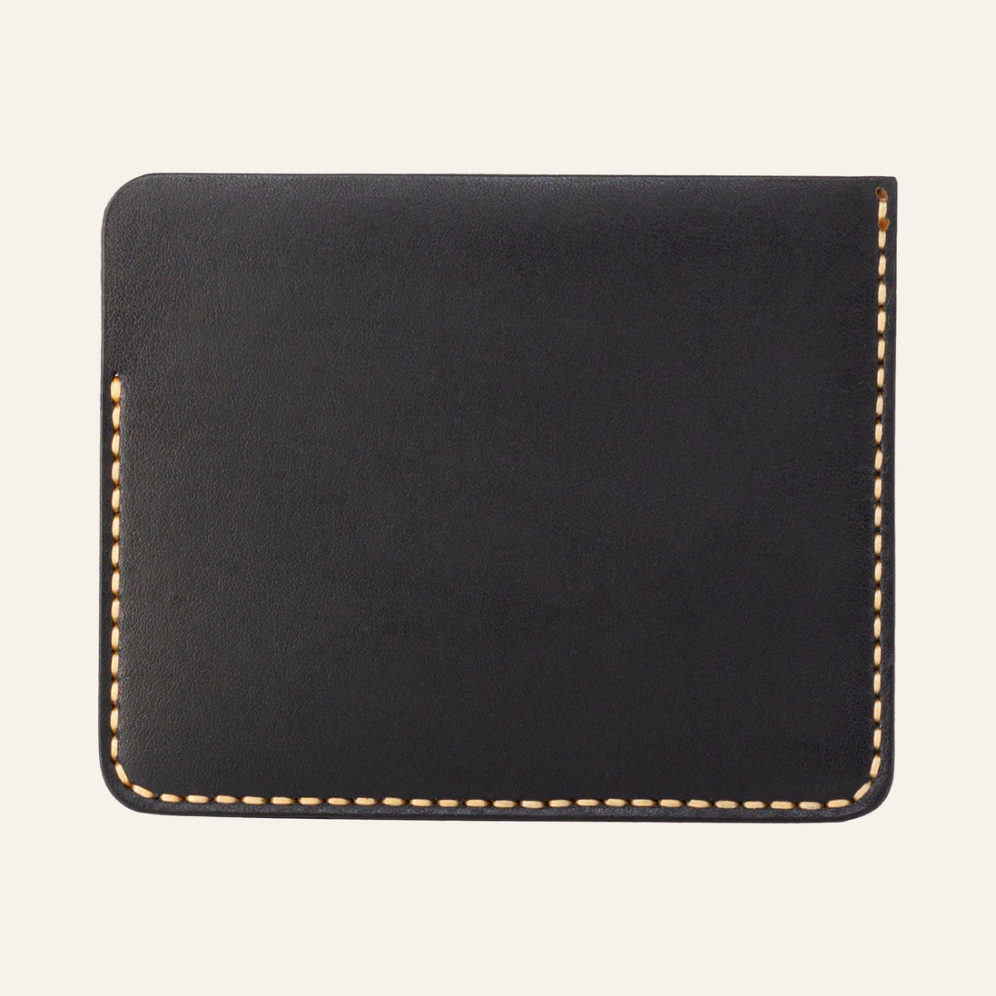 MZ Leather Craft siyah Buttero deri ters cüzdan, kesintisiz düz deri paneli ve çevreleyen sarı el dikişlerini gösteren arka görünüm