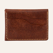 MZ Leather Craft çift çıtçıtlı kapaklı minimalist kiremit Pueblo deri cüzdan boş arka görünüm, kıvrımlı iki adet kart yuvası, açık gri saraç dikişleri ve kabartmalı MZ logosu