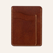 MZ Leather Craft dikey minimalist kiremit Pueblo deri kartlık, boş kart yuvalarını ve mat deri dokusunu gösteren düz ön görünüm, sarı el dikişleri ve kabartmalı MZ logosu
