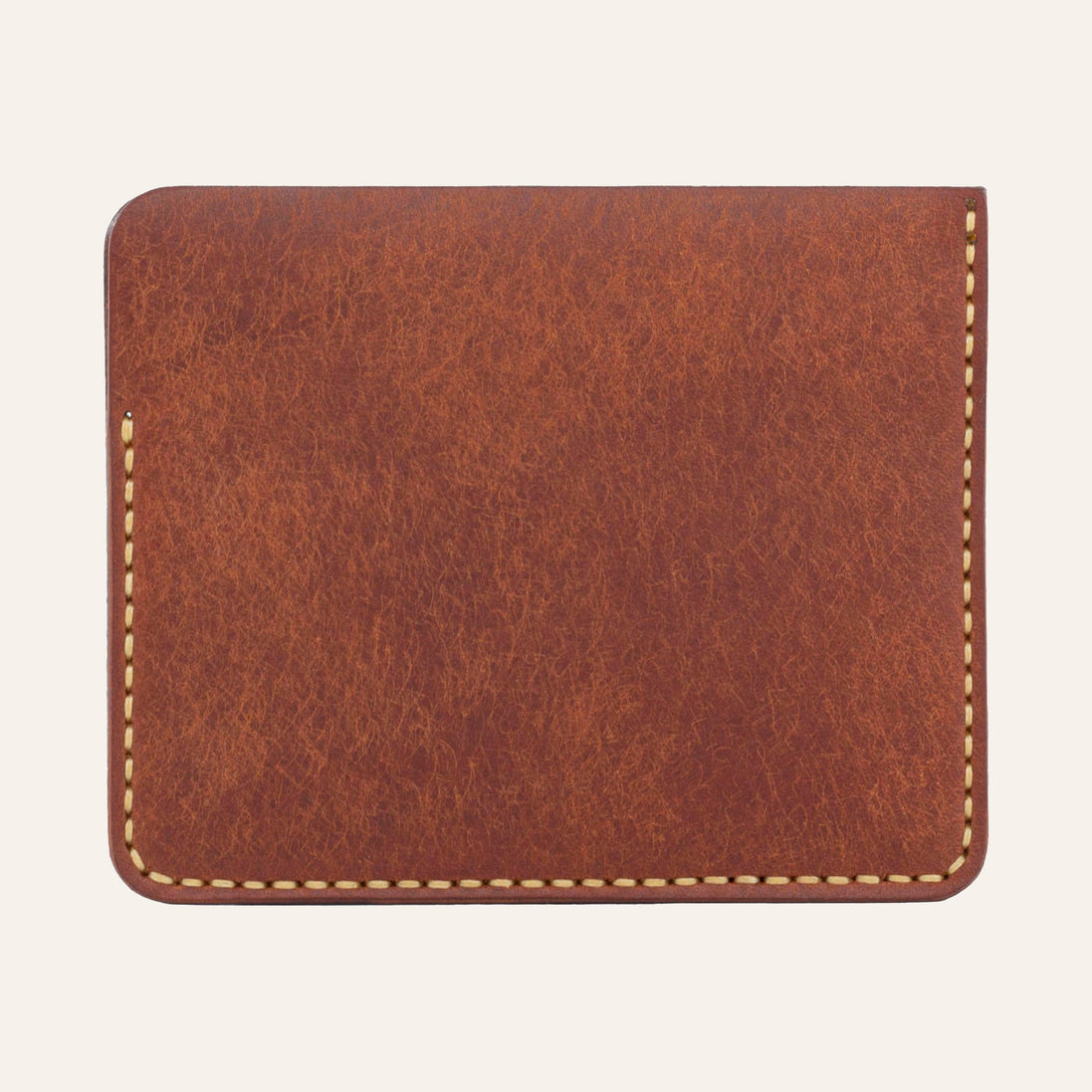 MZ Leather Craft kiremit Pueblo deri ters cüzdan, kesintisiz düz deri paneli ve çevreleyen sarı el dikişlerini gösteren arka görünüm