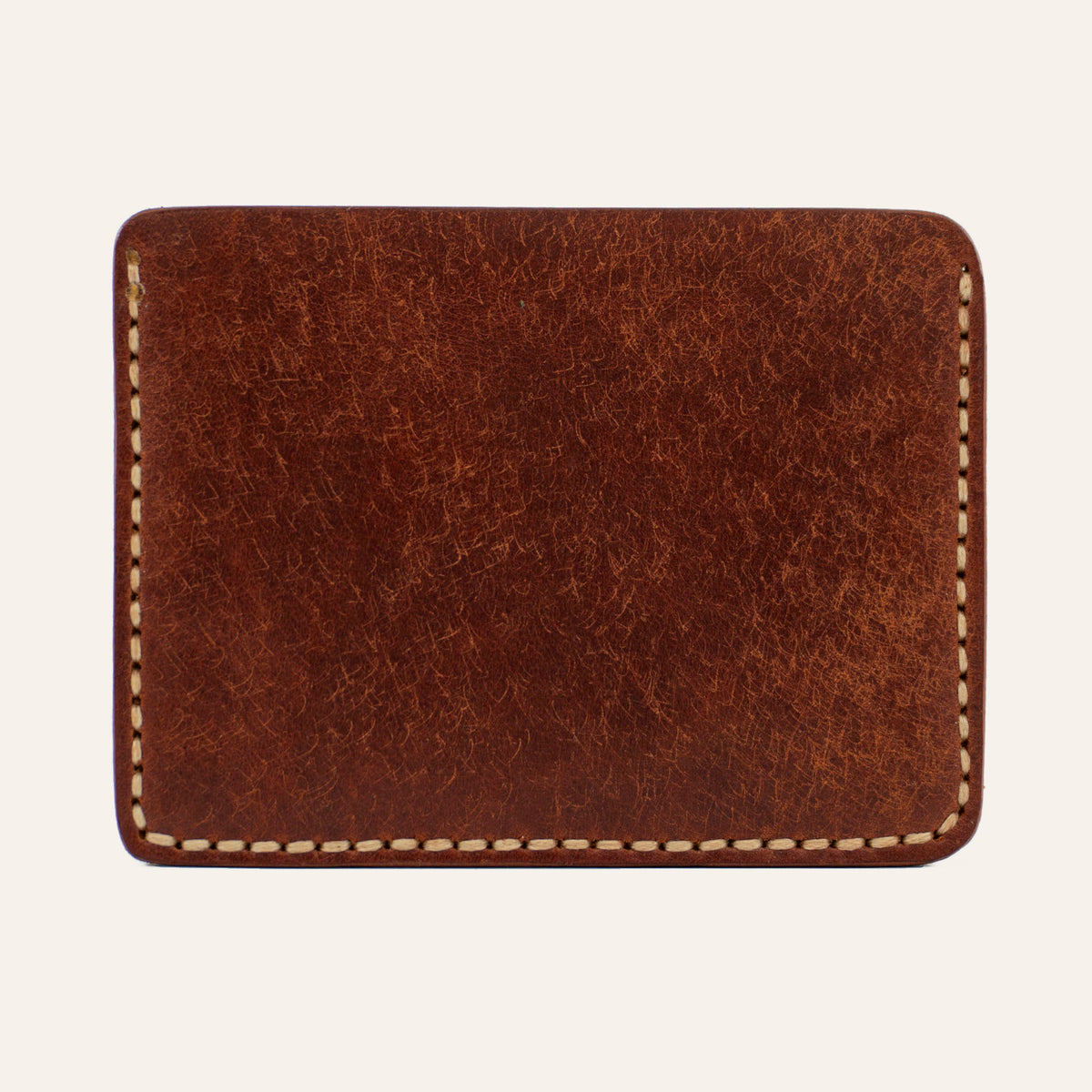 MZ Leather Craft yatay minimalist kiremit Pueblo deri kartlık, temiz arka paneli ve çevreleyen açık gri el dikişlerini gösteren arka görünüm