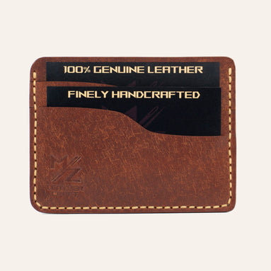 MZ Leather Craft yatay minimalist kiremit Pueblo deri kartlık, kartlarla dolu önden görünüm, sarı el dikişleri ve sol alt köşede kabartmalı MZ logosu